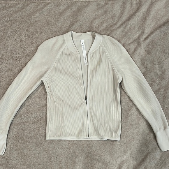 lululemon athletica Sweaters - Lululemon light ribbed knit sweater color bone size M!